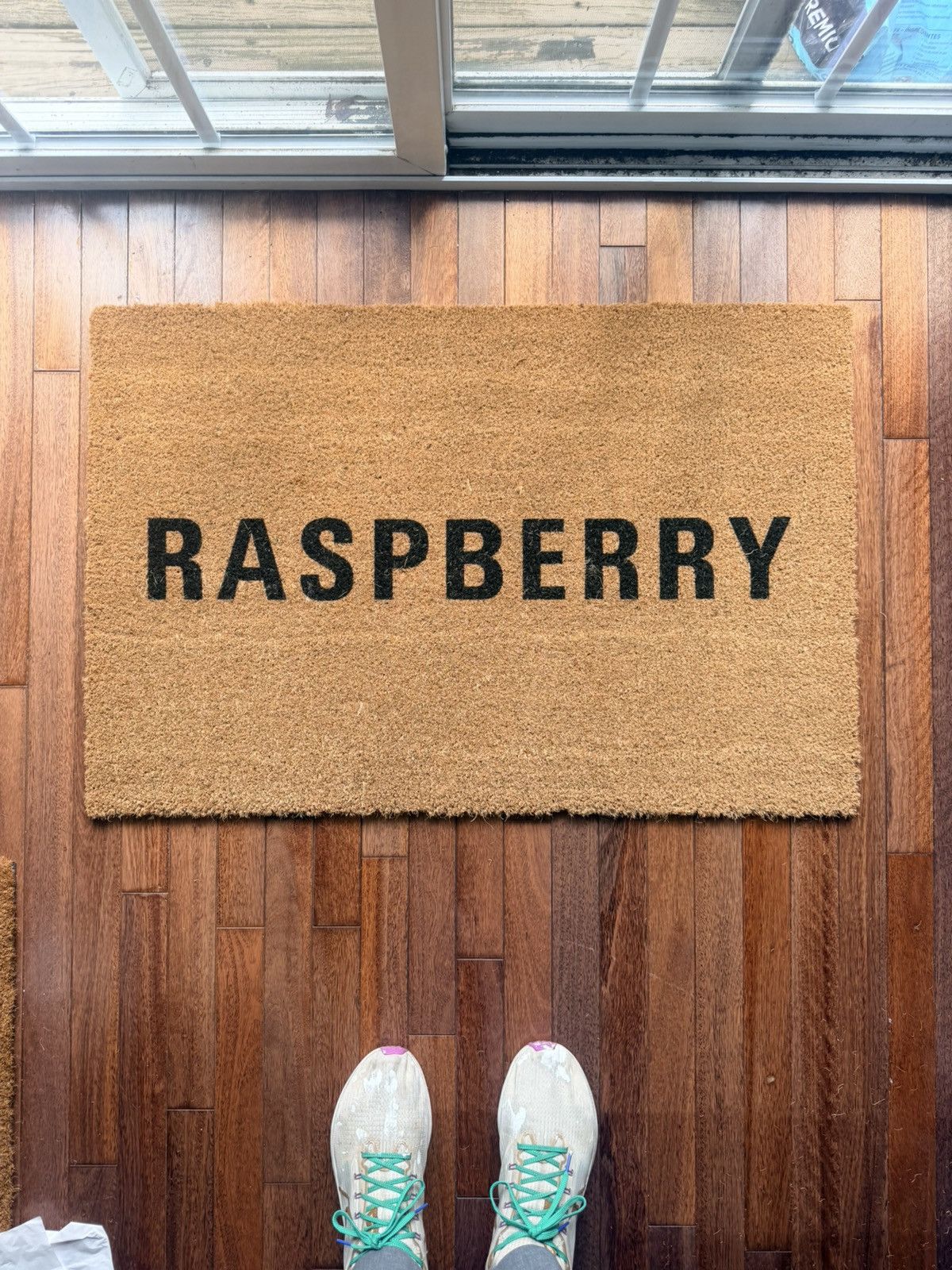 The GV Gallery Raspberry Hills Door Mat - Beige - Size OS - Front View