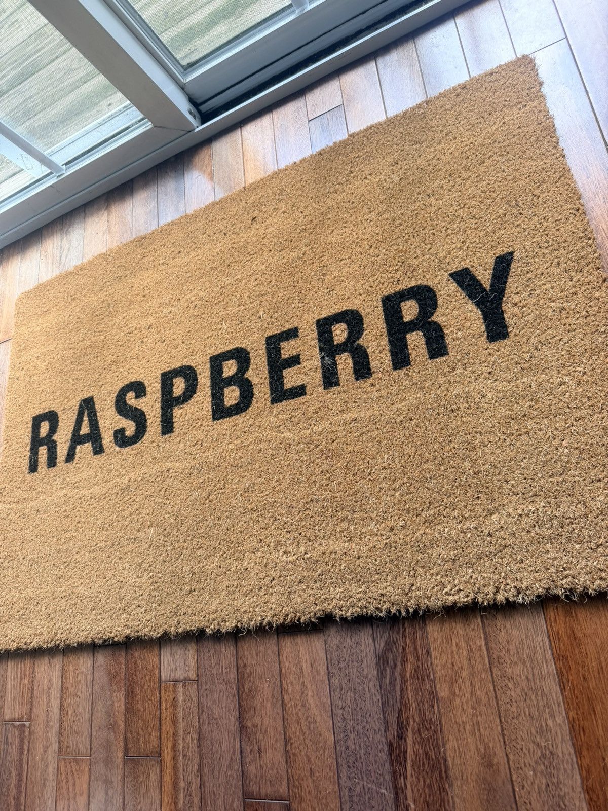 The GV Gallery Raspberry Hills Door Mat - Beige - Size OS - Back View